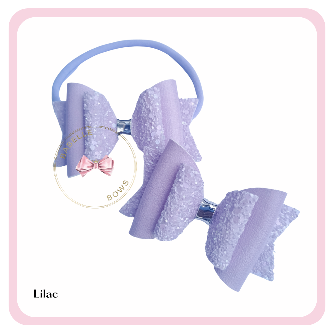 Add that extra touch of girly sweetness to your little girl's outfits with our Perfect Pastel Glitter Bows. Each bow measures 3.25/8cm.