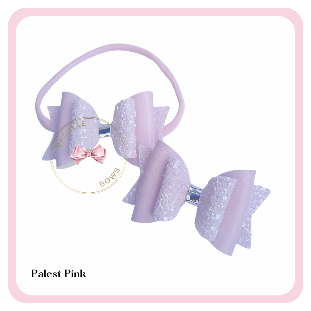 Add that extra touch of girly sweetness to your little girl's outfits with our Perfect Pastel Glitter Bows. Each bow measures 3.25/8cm.